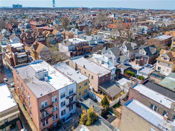 an aerial view of a city with lots of residential buildings