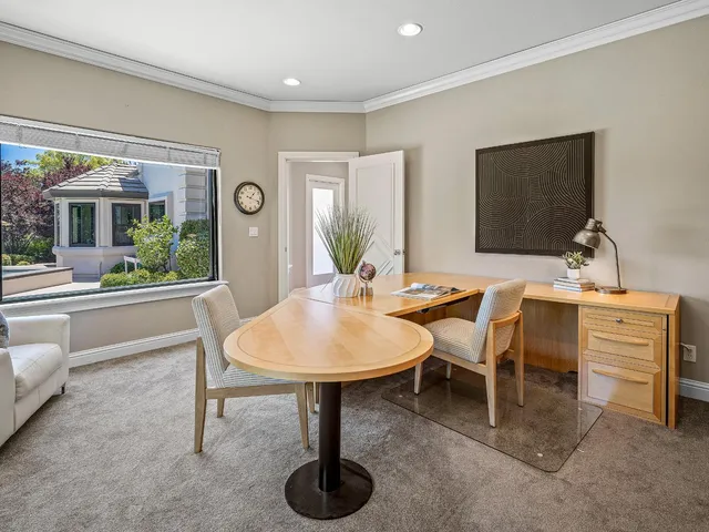 a view of a golf course with a lake