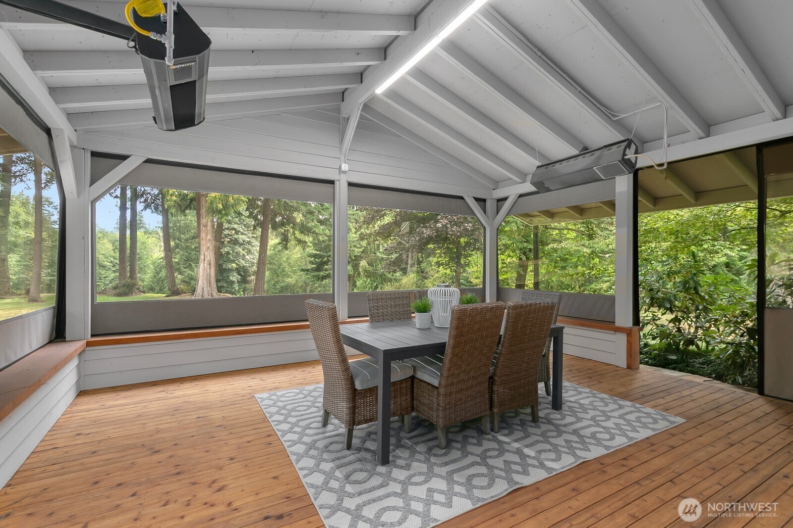 24020 Southeast 202nd Street Maple Valley, WA 98038 - Photo 13 of 39 a dining room with wooden floor table and chairs
