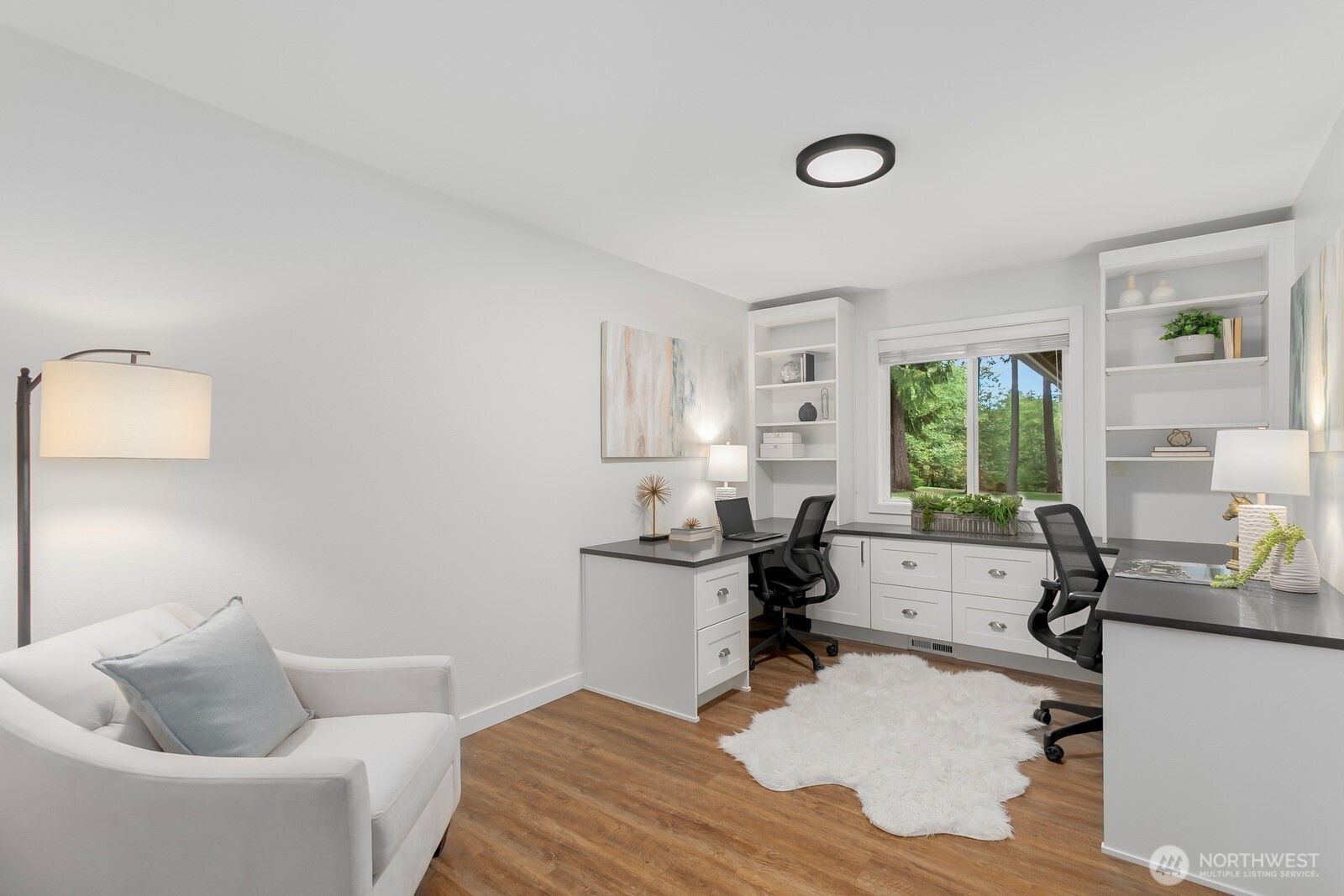 24020 Southeast 202nd Street Maple Valley, WA 98038 - Photo 14 of 39 a living room with furniture and a window