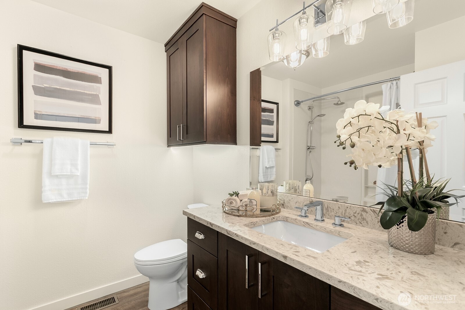 24020 Southeast 202nd Street Maple Valley, WA 98038 - Photo 15 of 39 a bathroom with a granite countertop sink a toilet and mirror