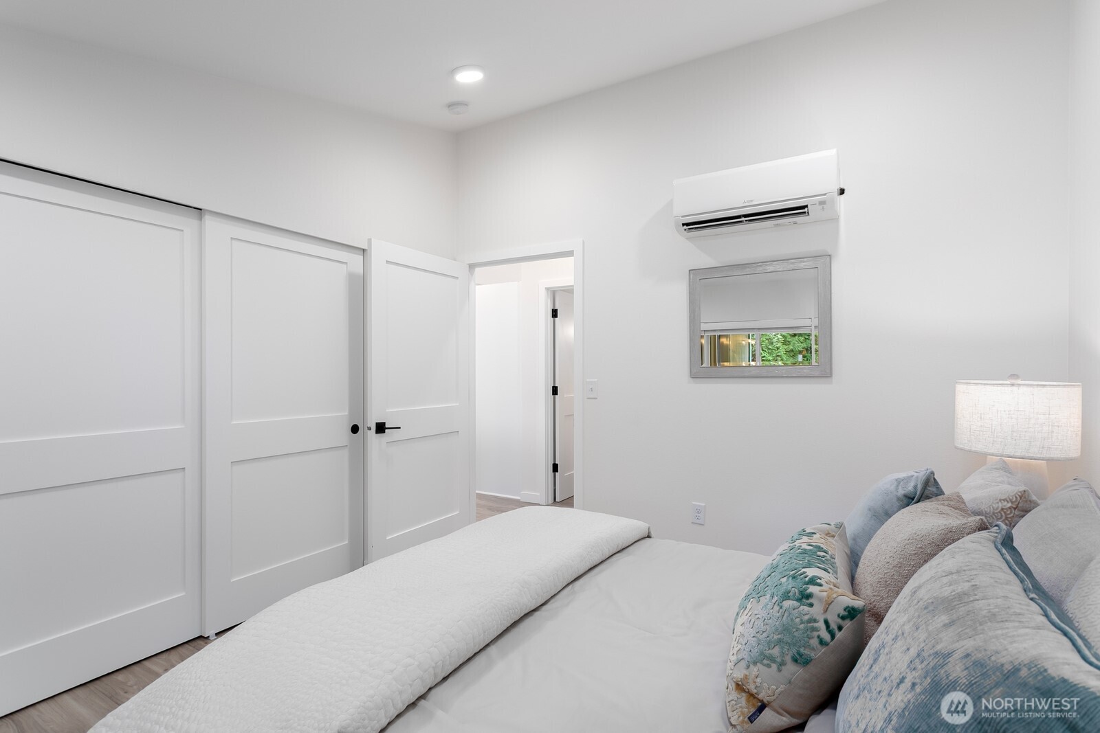 24020 Southeast 202nd Street Maple Valley, WA 98038 - Photo 31 of 39 a bedroom with a bed and a painting on the wall