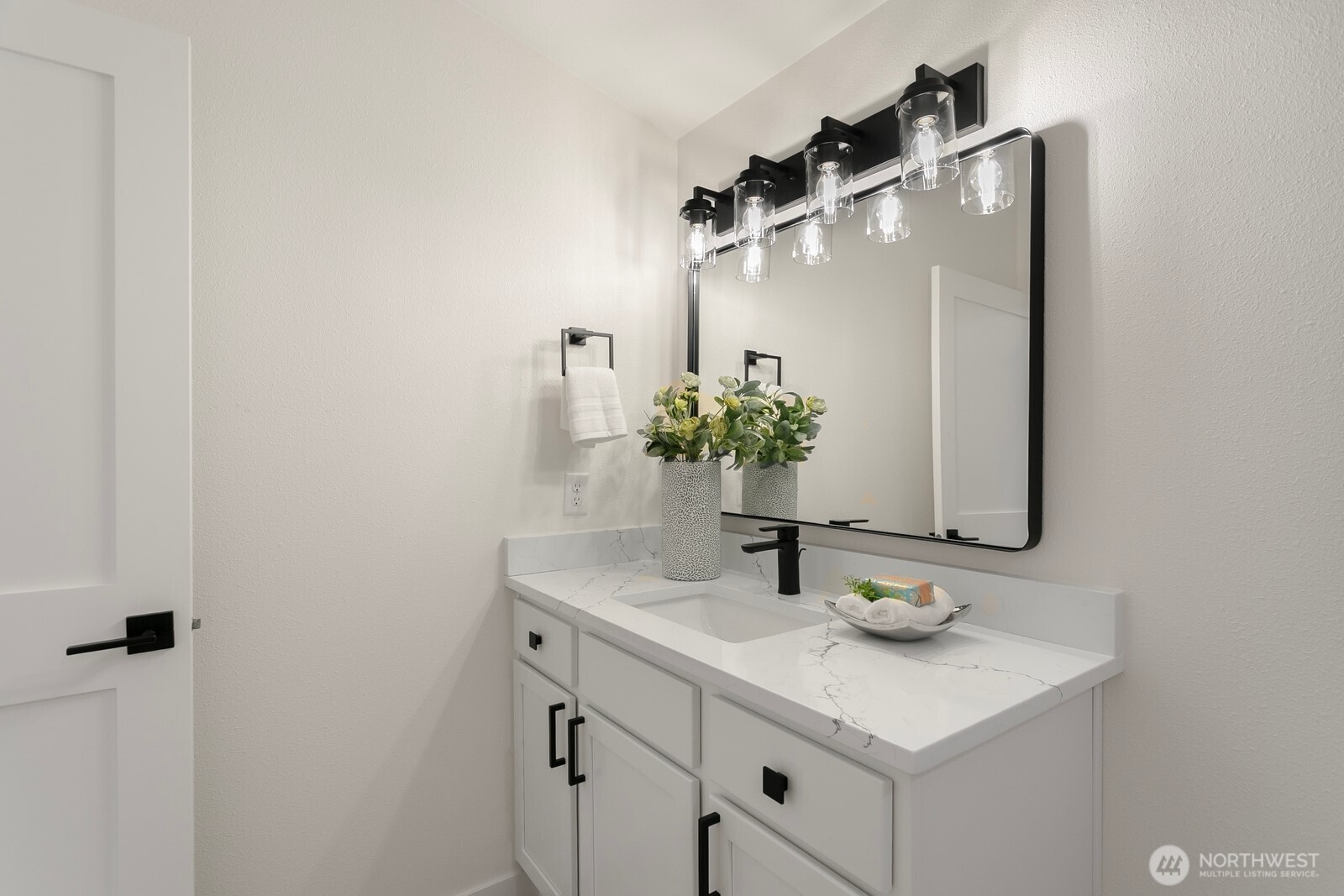 24020 Southeast 202nd Street Maple Valley, WA 98038 - Photo 32 of 39 a bathroom with a sink and a mirror
