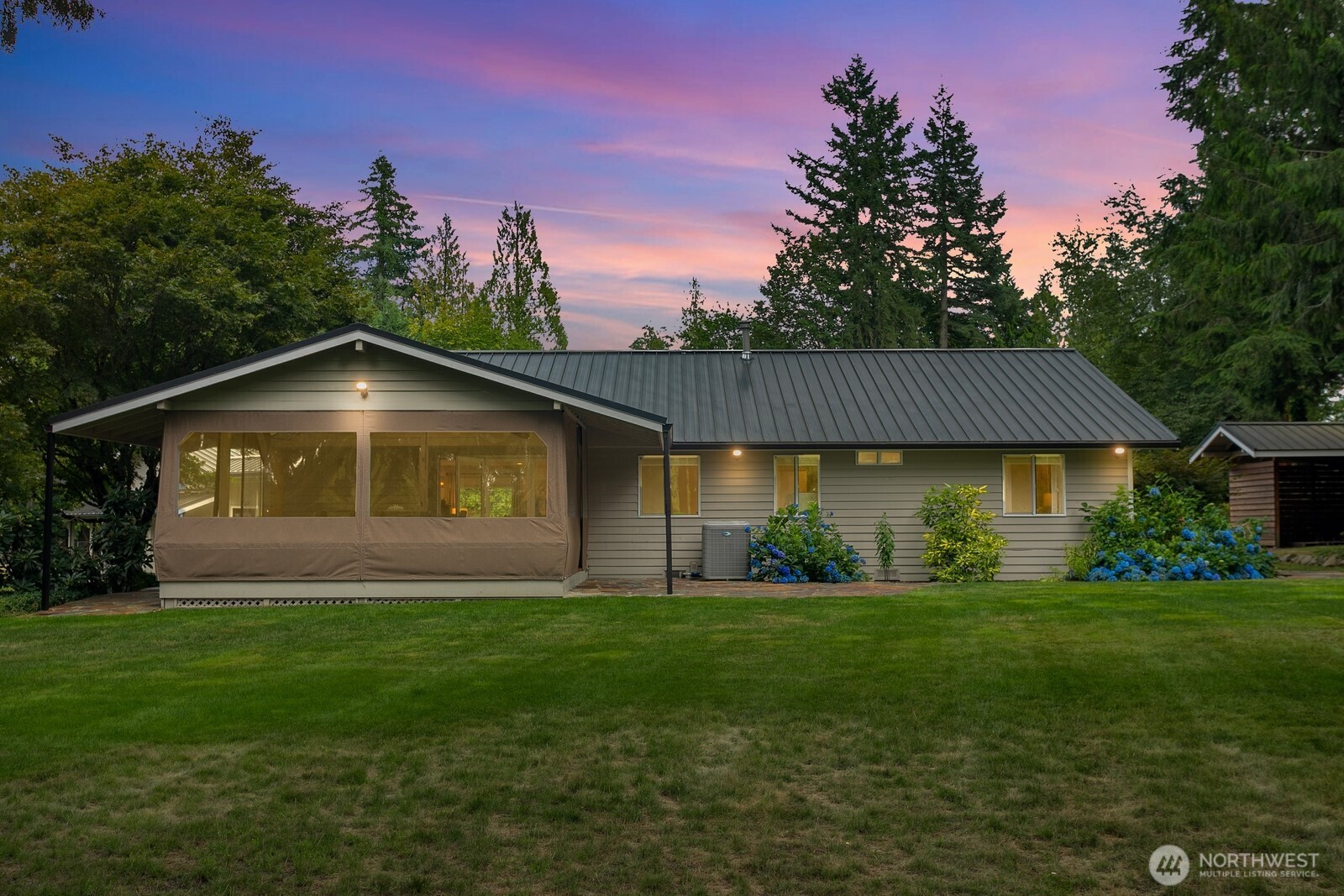 24020 Southeast 202nd Street Maple Valley, WA 98038 - Photo 38 of 39 a view of a house with a yard