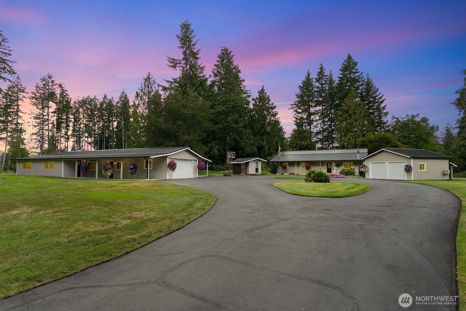 24020 Southeast 202nd Street Maple Valley, WA 98038 - Photo 39 of 39 a front view of a house with garden