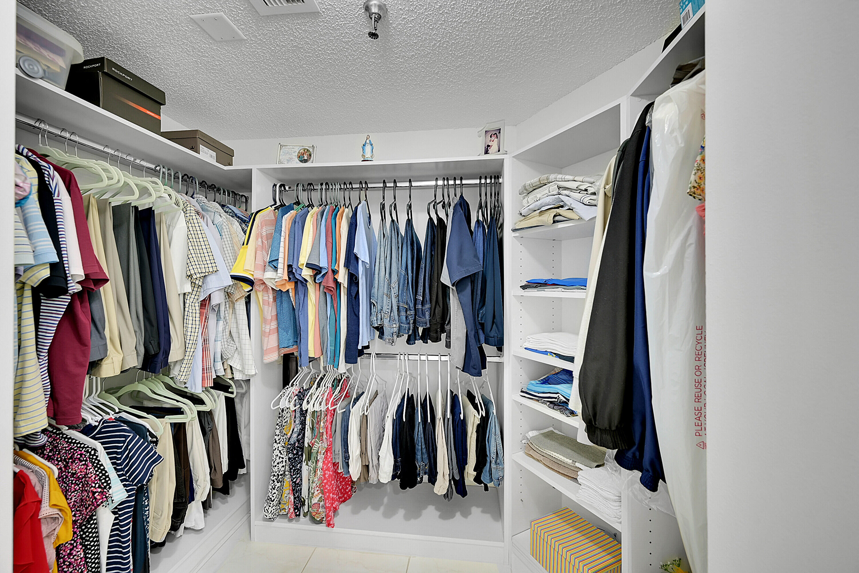 9165 Southwest 14th Street, Unit 1304 Boca Raton, FL 33428 - Photo 16 of 38 Walk-In Closet