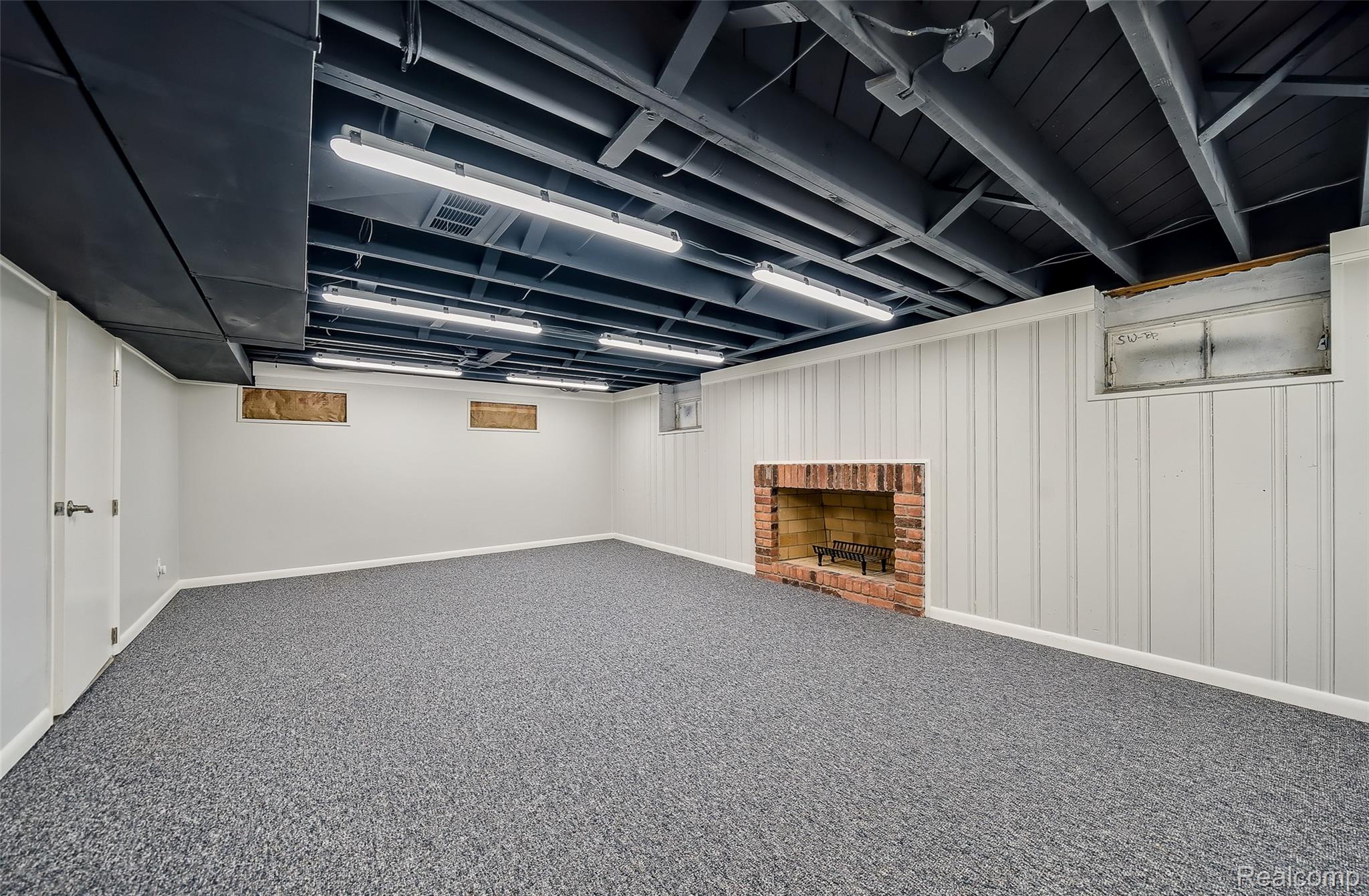 100 Overhill Road Bloomfield Hills, MI 48301 - Photo 31 of 55 Finished below grade area featuring baseboards and carpet floors