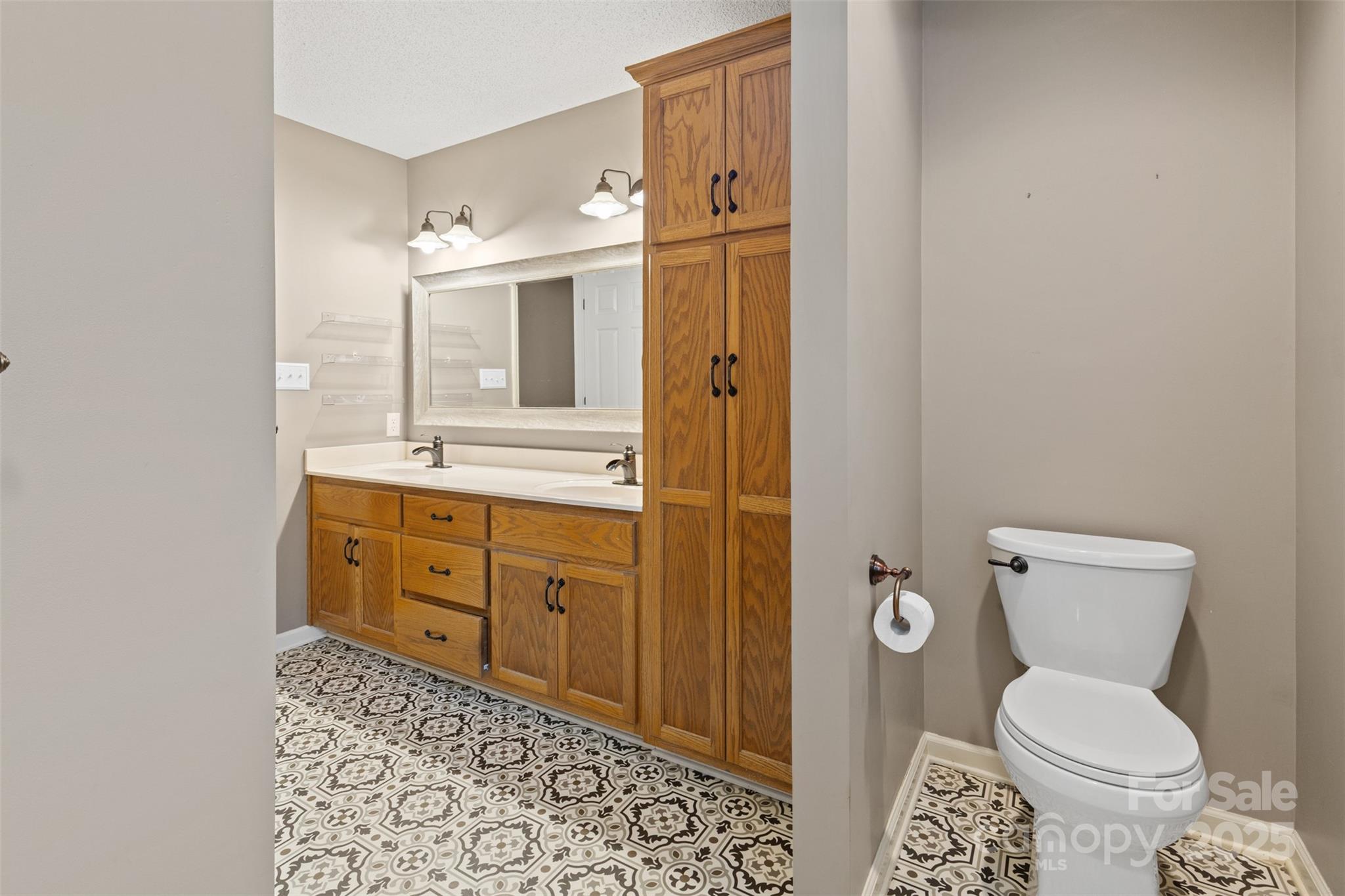 3233 6th Avenue Northeast Conover, NC 28613 - Photo 15 of 30 a bathroom with a sink toilet and shower