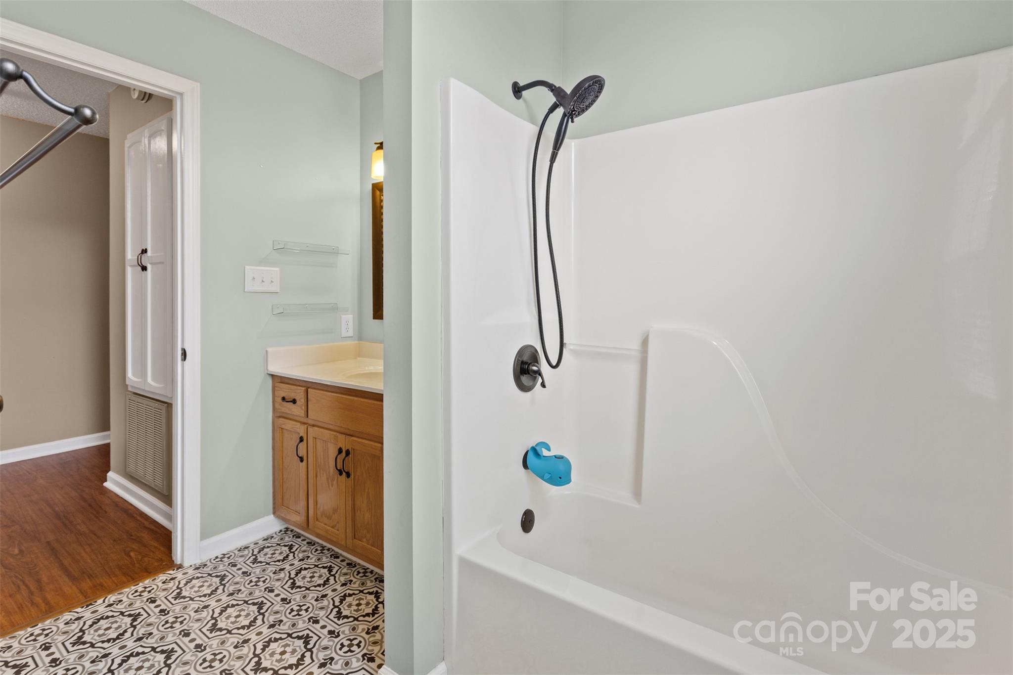 3233 6th Avenue Northeast Conover, NC 28613 - Photo 21 of 30 a bathroom with a bathtub and a shower