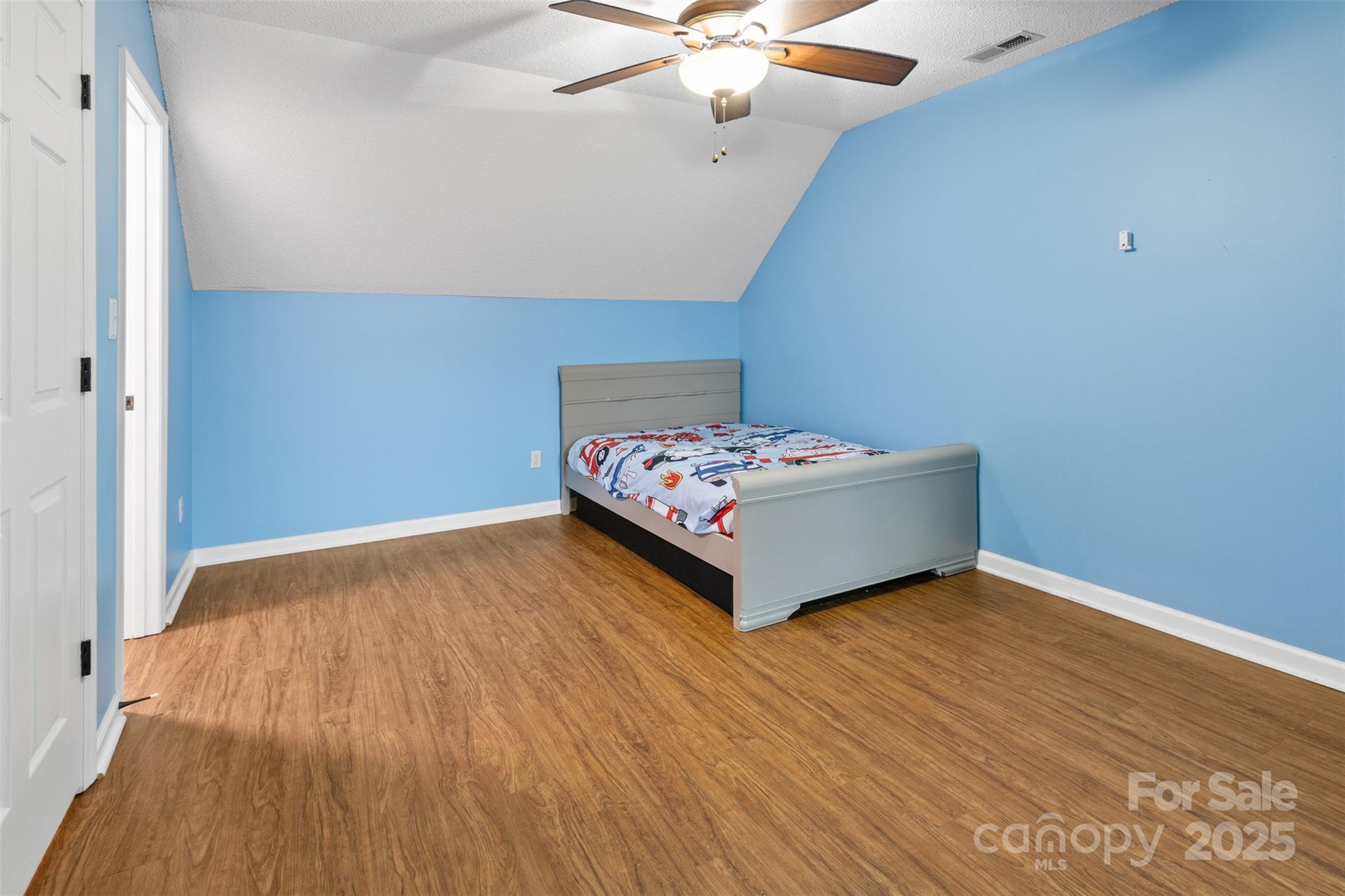 3233 6th Avenue Northeast Conover, NC 28613 - Photo 22 of 30 a bedroom with a bed and a table