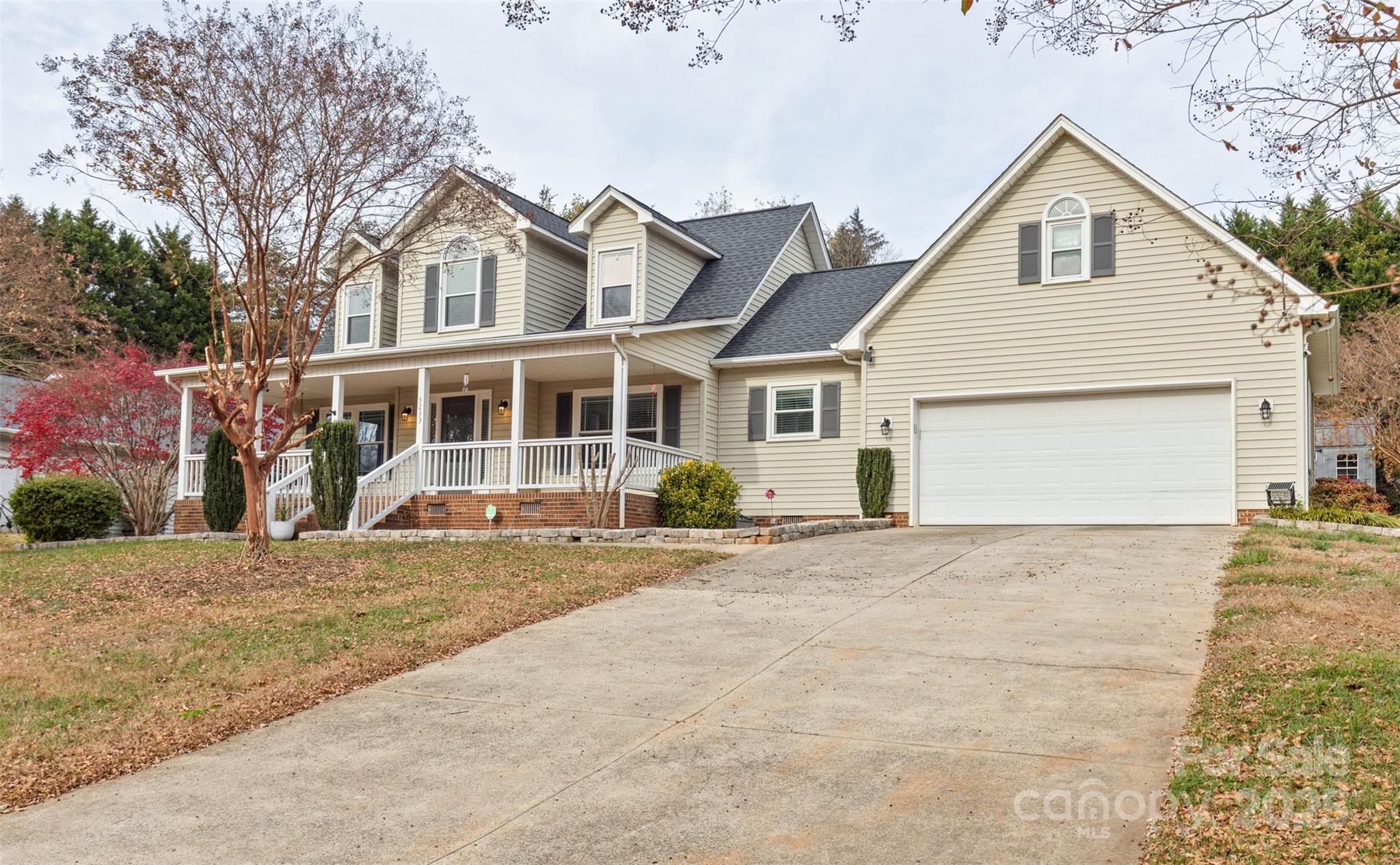 3233 6th Avenue Northeast Conover, NC 28613 - Photo 23 of 30 a view of a house with a yard and large tree