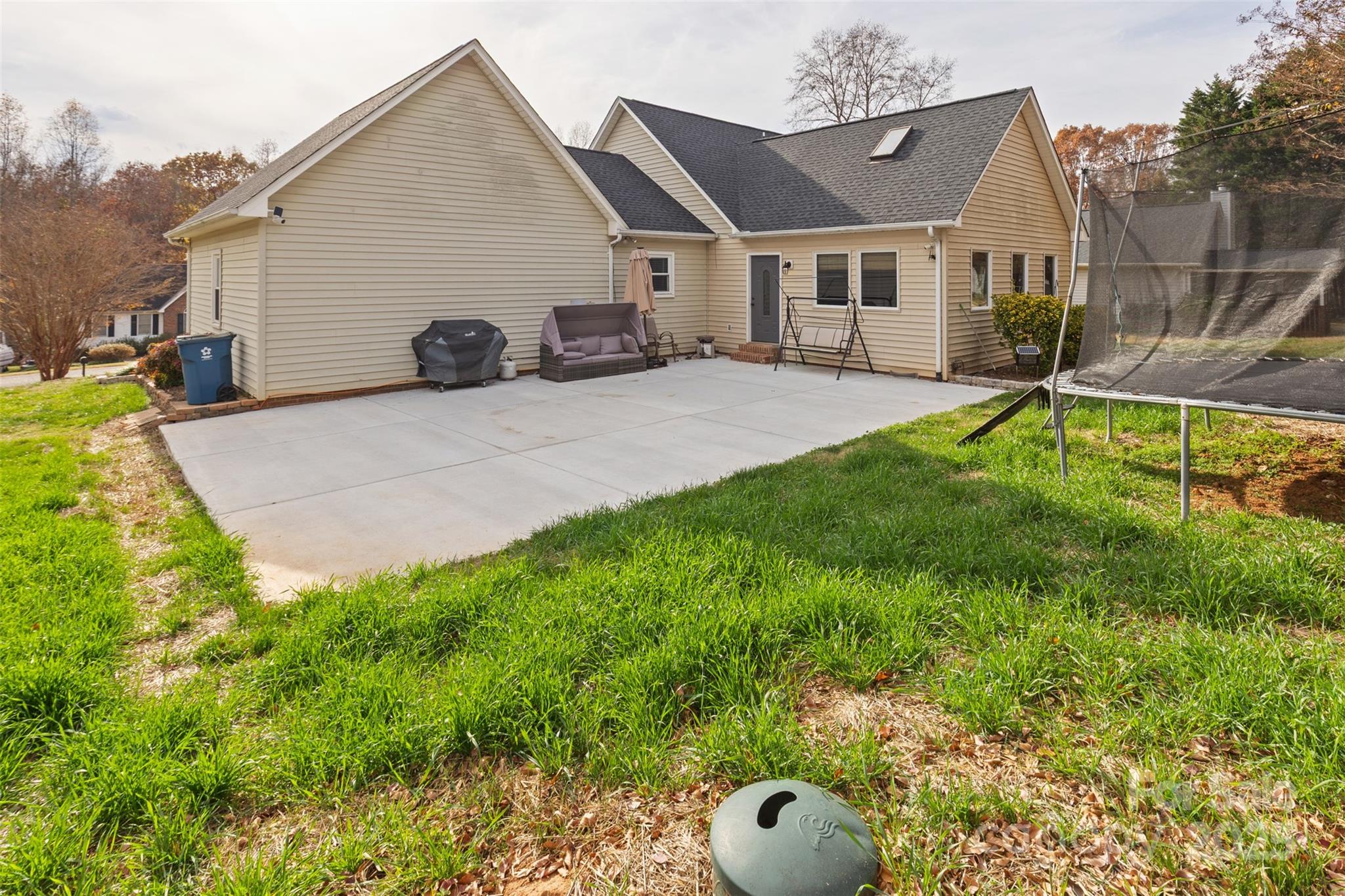 3233 6th Avenue Northeast Conover, NC 28613 - Photo 25 of 30 a view of a yard in front of a house with large tree