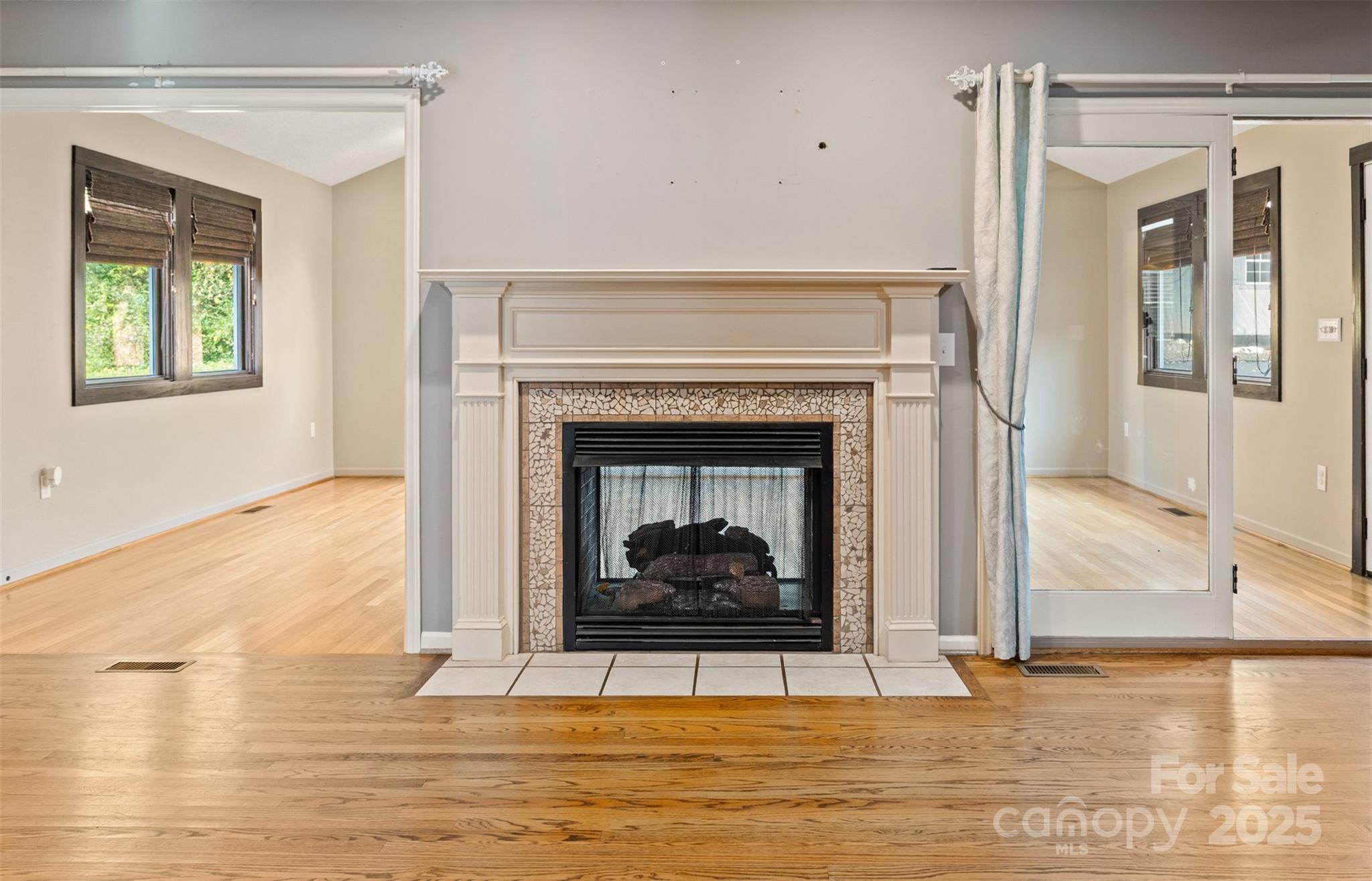 3233 6th Avenue Northeast Conover, NC 28613 - Photo 29 of 30 a living room with a fireplace