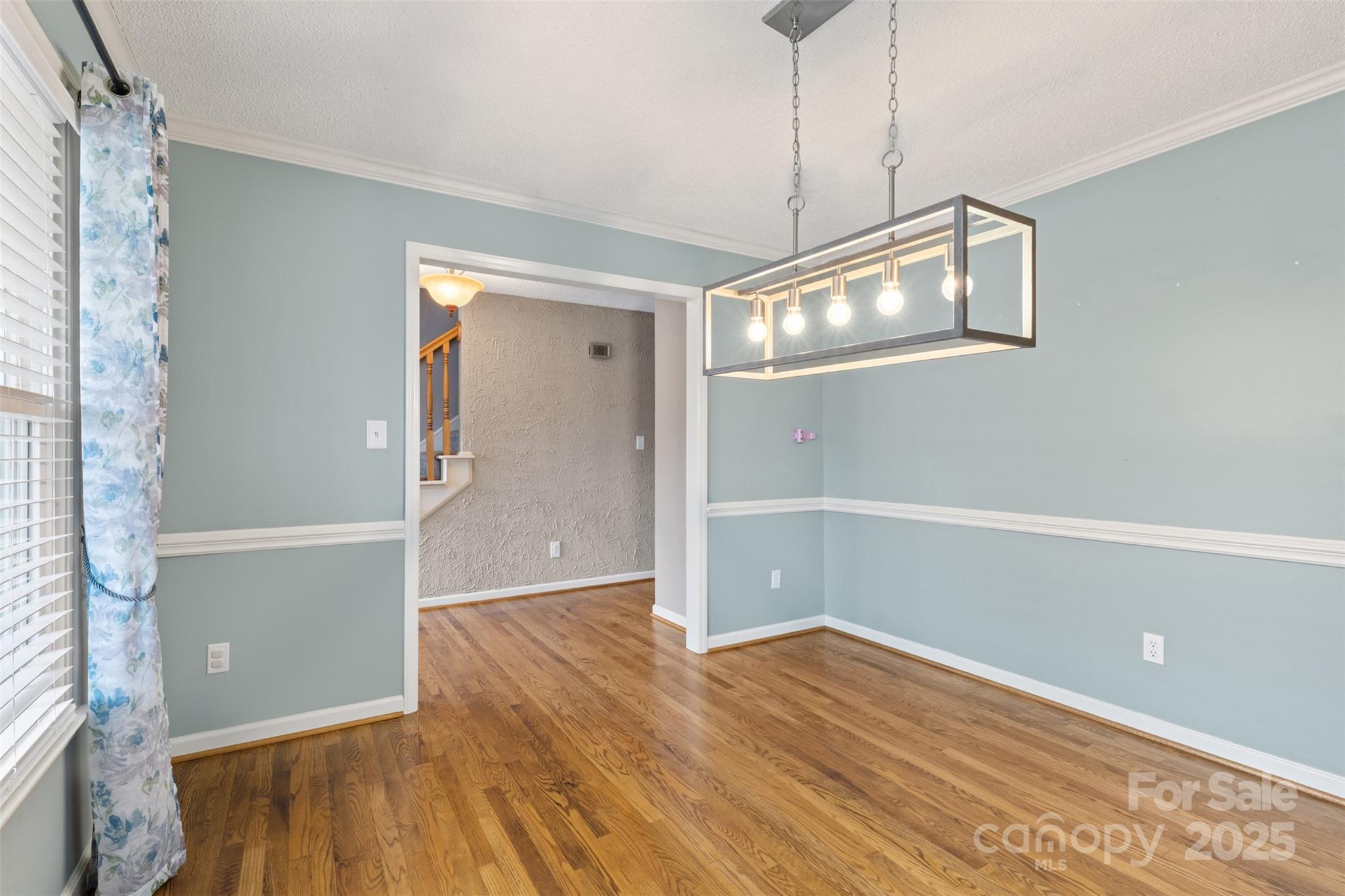3233 6th Avenue Northeast Conover, NC 28613 - Photo 6 of 30 wooden floor in an empty room