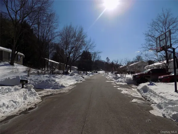 a view of a road with a snow on the road