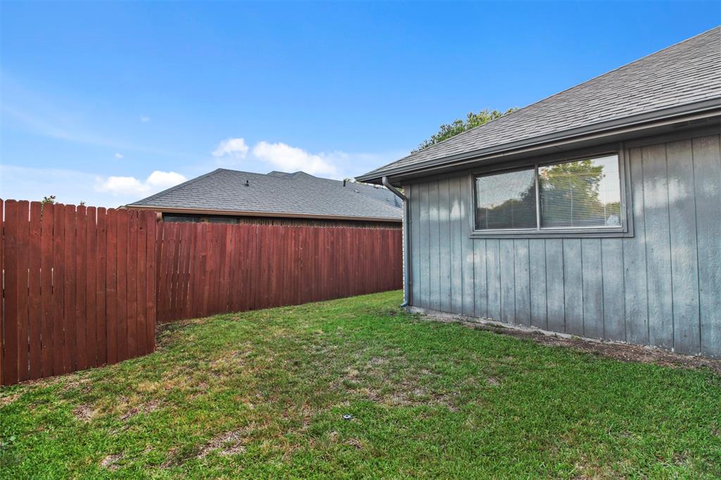 4017 St Christopher Lane Dallas, TX 75287 - Photo 16 of 16 a view of wooden fence