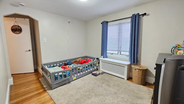 a living room with furniture and a gate