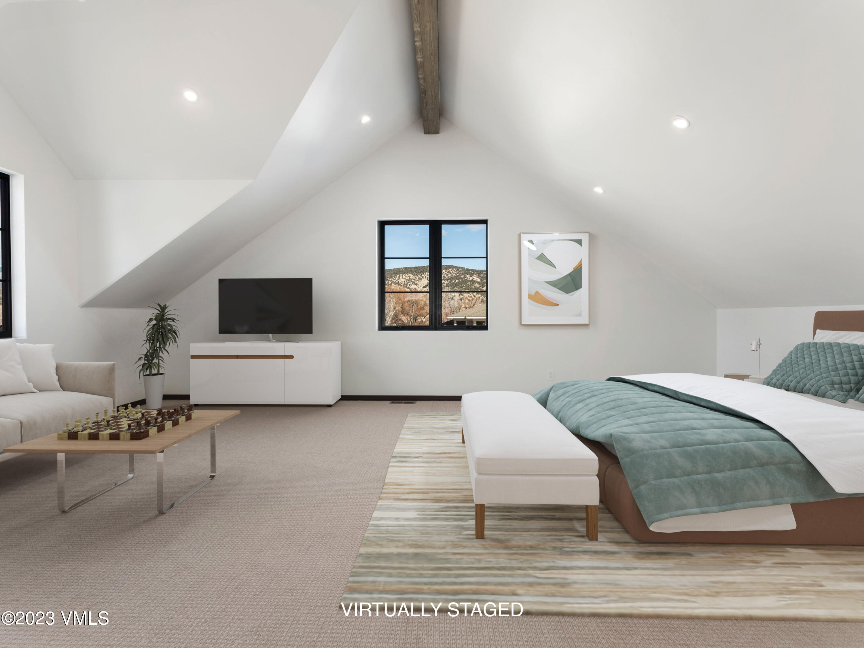 2494 Eagle Ranch Road Eagle, CO 81631 - Photo 26 of 49 a spacious bedroom with a bed and a flat screen tv