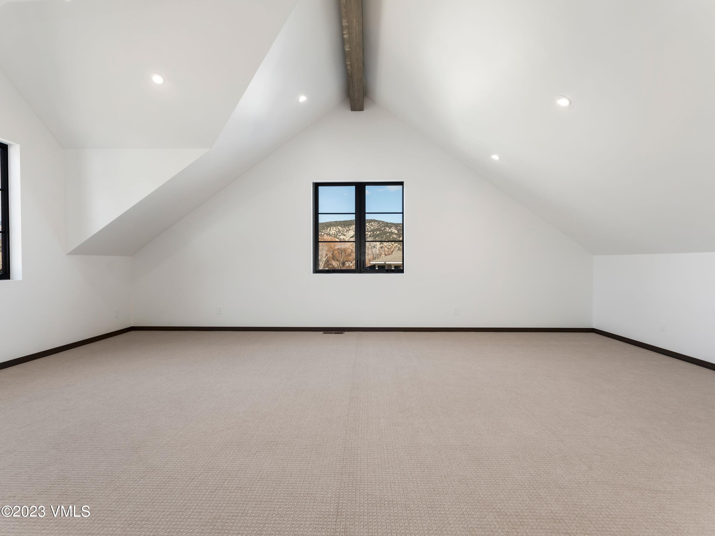2494 Eagle Ranch Road Eagle, CO 81631 - Photo 27 of 49 an empty room with a window
