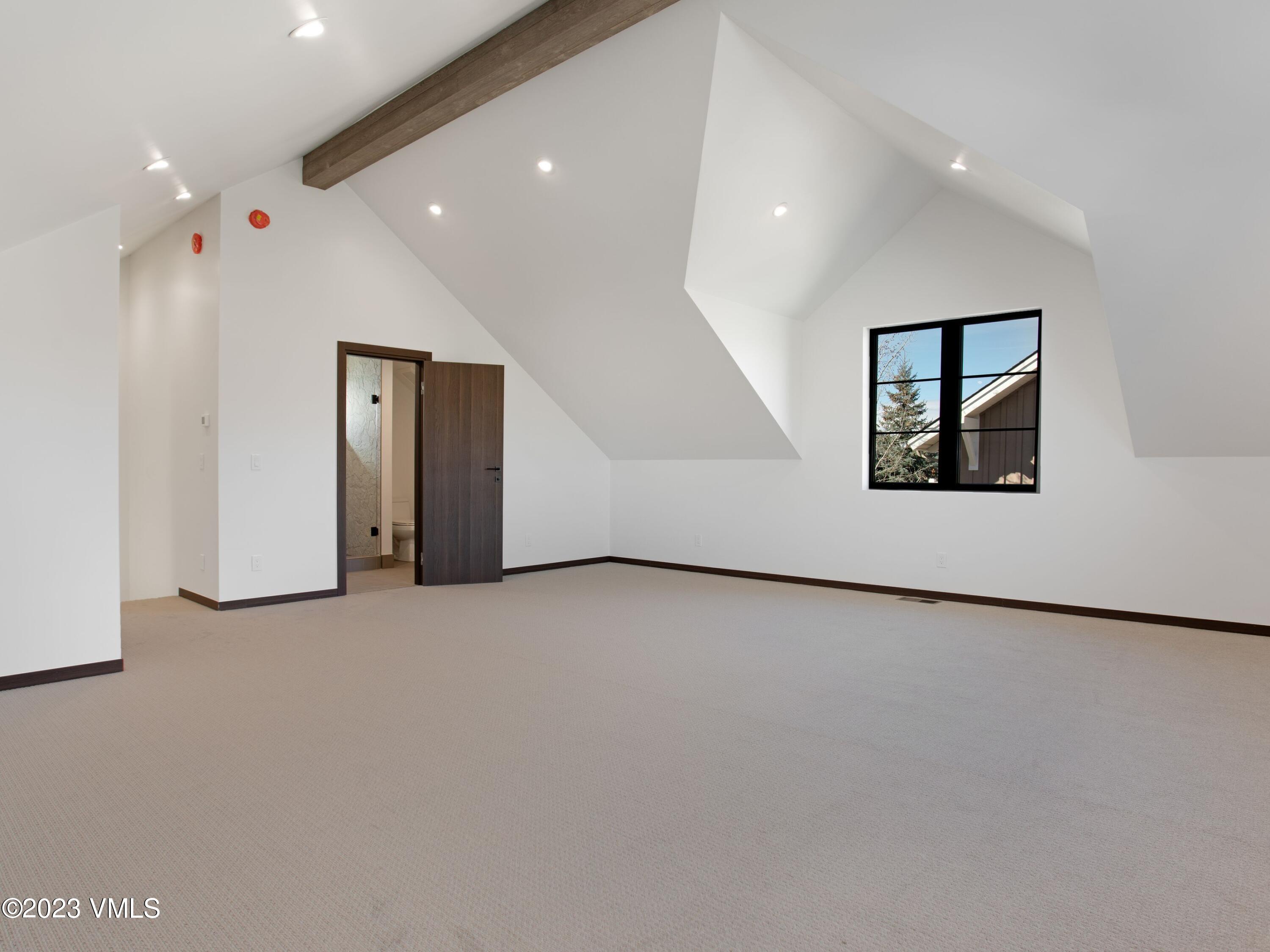 2494 Eagle Ranch Road Eagle, CO 81631 - Photo 28 of 49 an empty room with a empty space and window