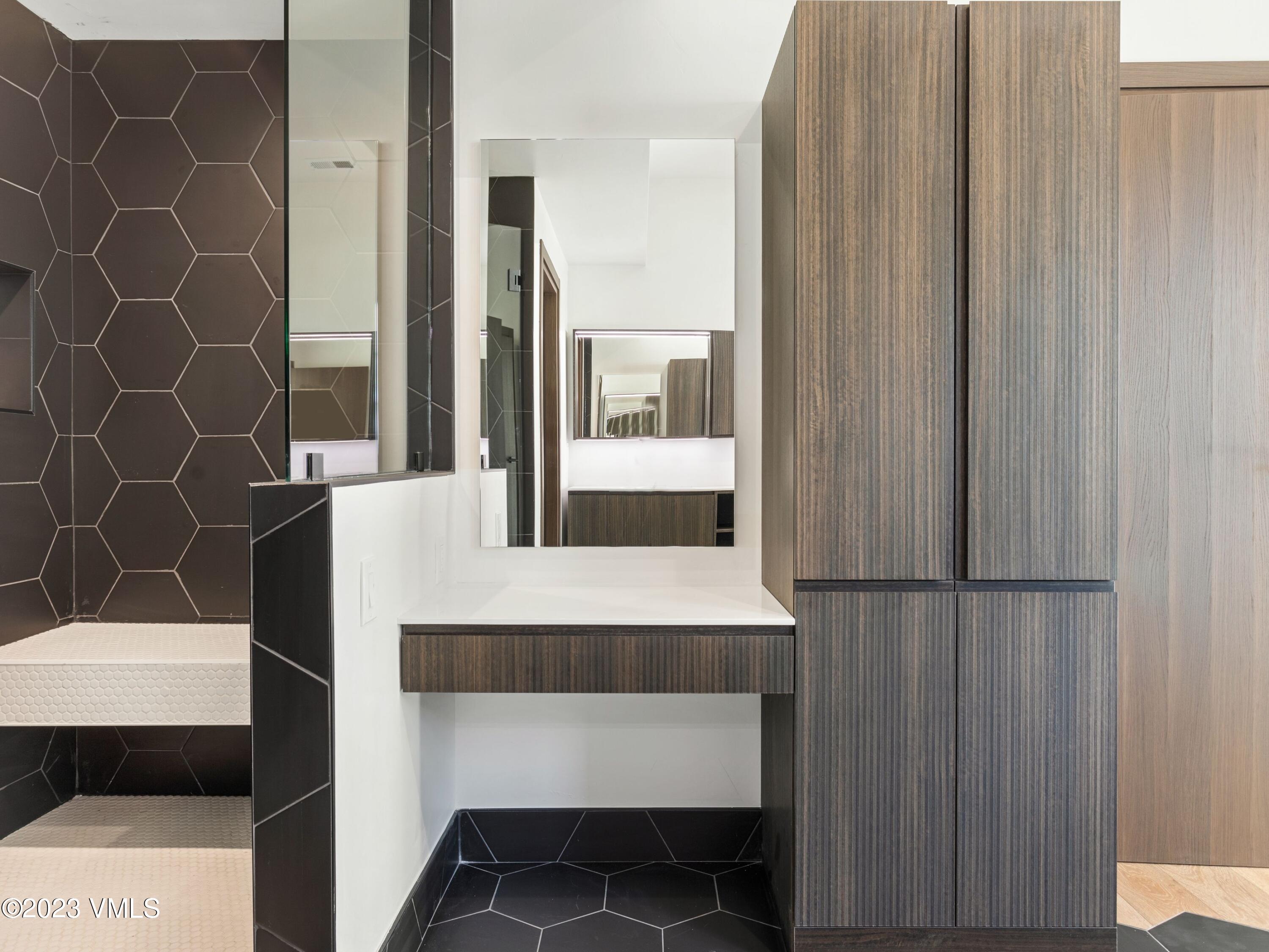 2494 Eagle Ranch Road Eagle, CO 81631 - Photo 34 of 49 a bathroom with a sink and a mirror