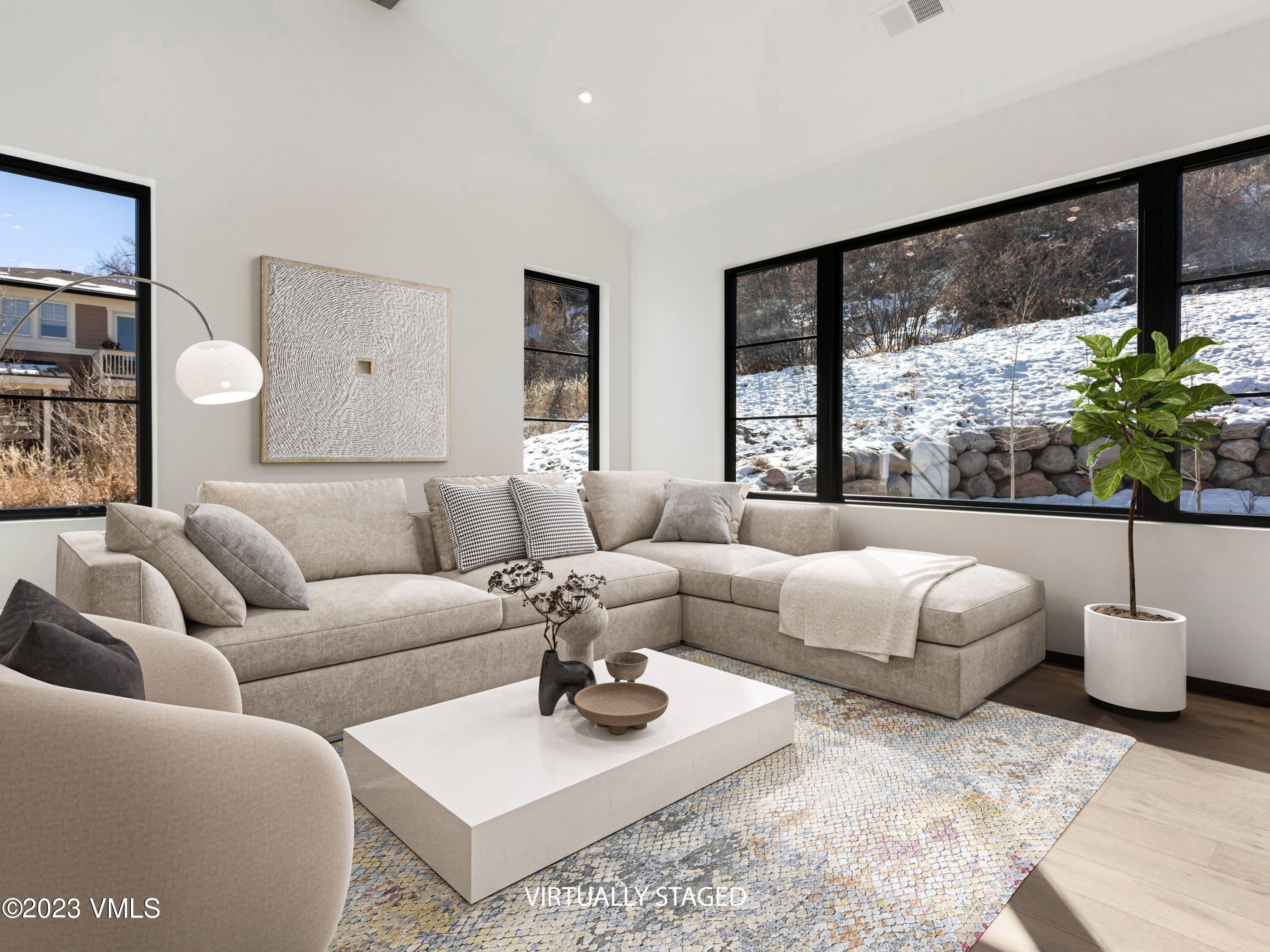 2494 Eagle Ranch Road Eagle, CO 81631 - Photo 4 of 49 a living room with furniture and a large window