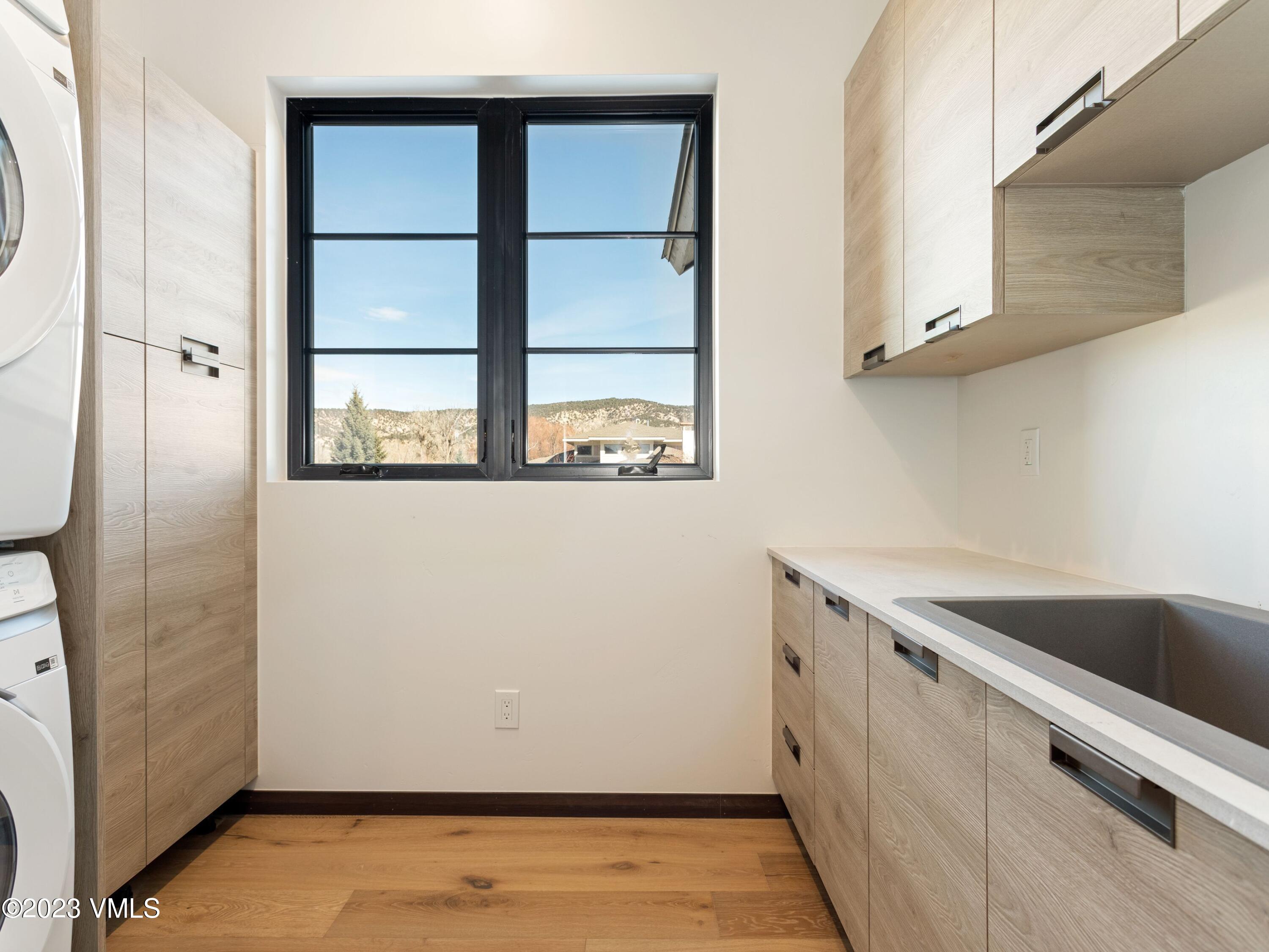 2494 Eagle Ranch Road Eagle, CO 81631 - Photo 43 of 49 a view of a kitchen with a sink and dishwasher