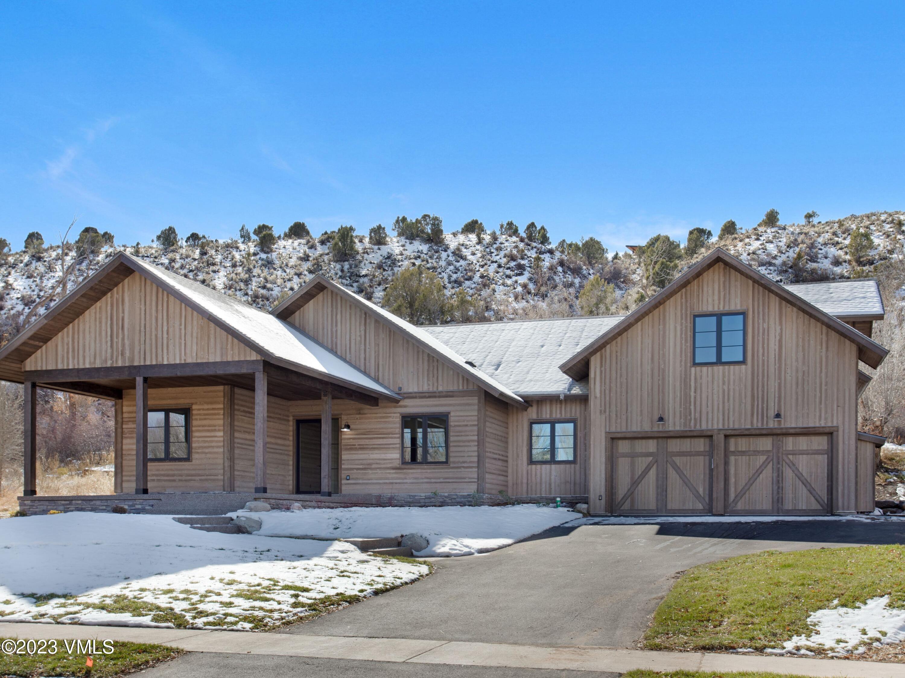 2494 Eagle Ranch Road Eagle, CO 81631 - Photo 46 of 49 a view of a house with wooden fence