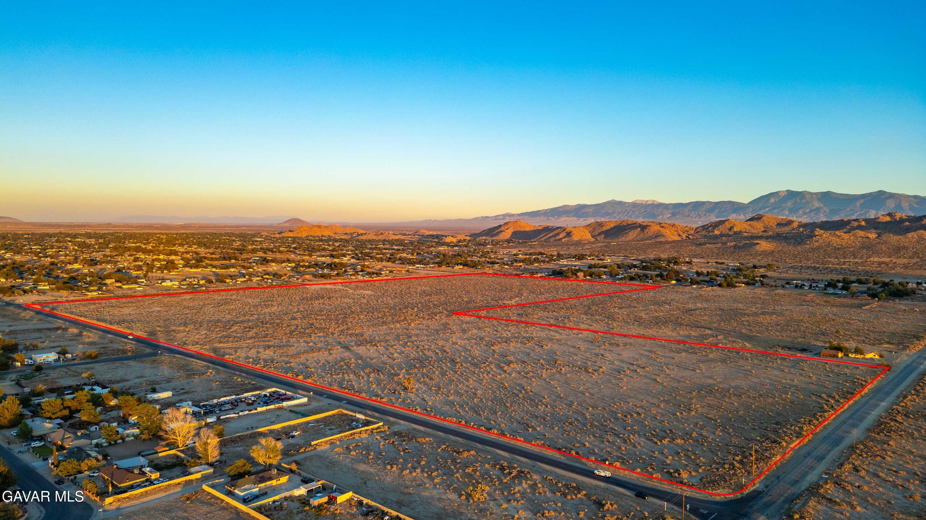 E Avenue East Lancaster, CA 93535 - Photo 7 of 11 an aerial view of residential houses with outdoor space and ocean view
