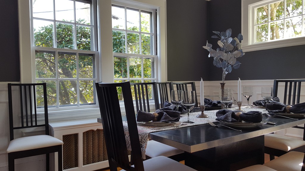 80 Rowena Road Newton, MA 02459 - Photo 3 of 7 a kitchen with a table chairs and a refrigerator