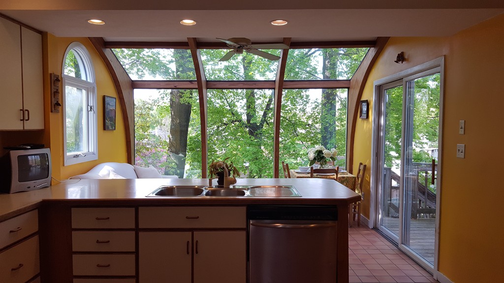 80 Rowena Road Newton, MA 02459 - Photo 4 of 7 a kitchen with large windows and sink