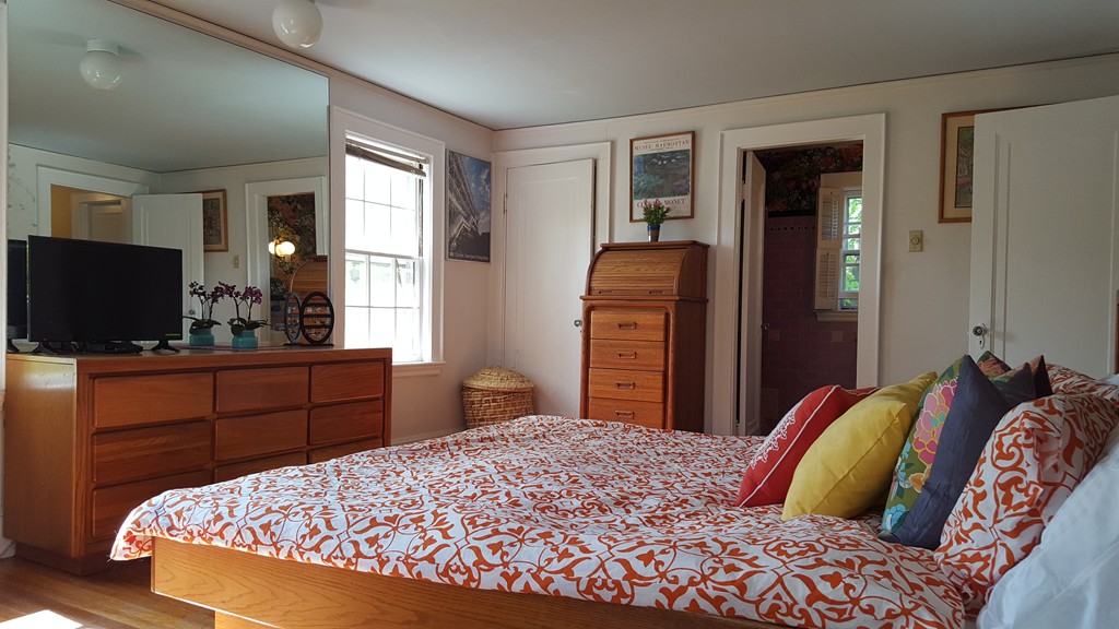 80 Rowena Road Newton, MA 02459 - Photo 6 of 7 a bedroom with a bed and a dresser