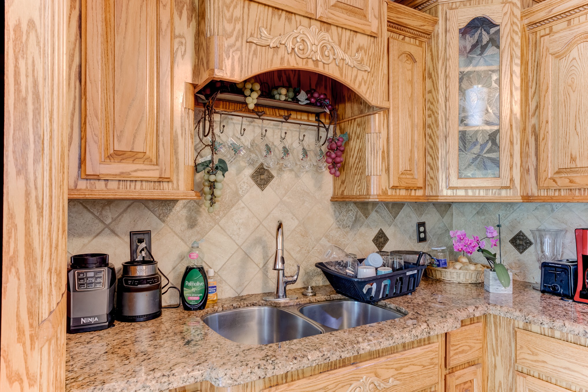 316 Hickman Lane Angleton, TX 77515 - Photo 15 of 48 a kitchen with a sink and cabinets