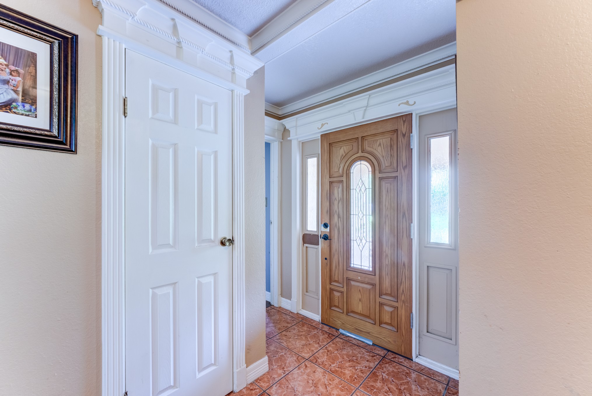 316 Hickman Lane Angleton, TX 77515 - Photo 18 of 48 a view of a hallway with wooden floor