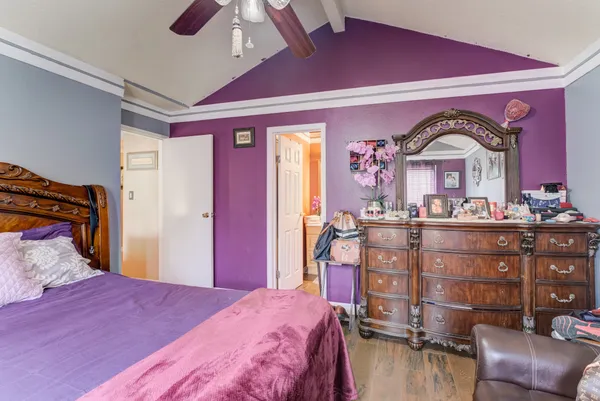 a bed room with a bed and a window