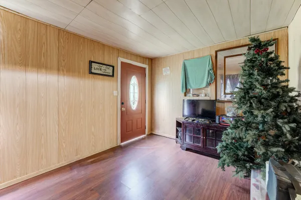 a kitchen with stainless steel appliances granite countertop a refrigerator and a stove