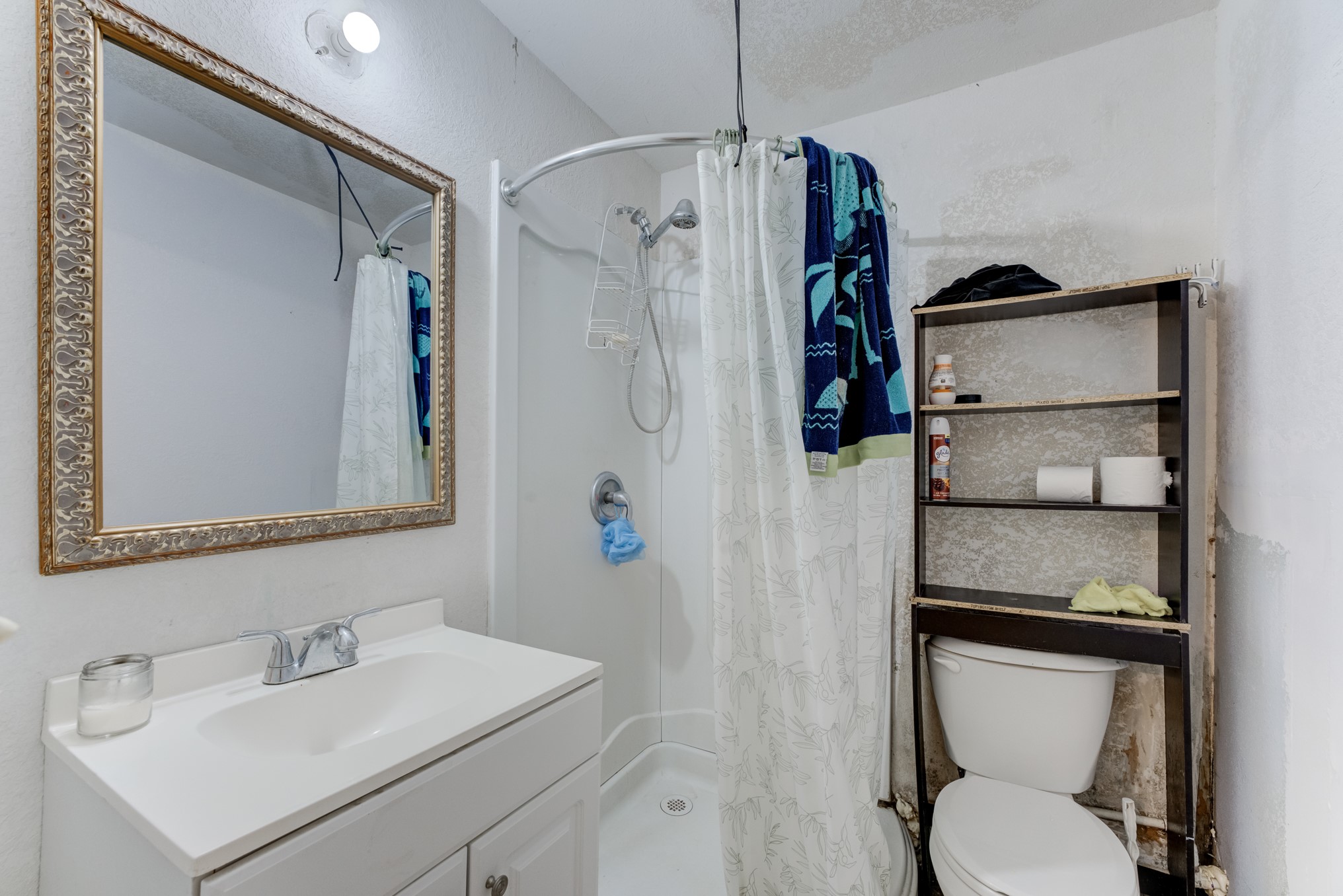 316 Hickman Lane Angleton, TX 77515 - Photo 35 of 48 a bathroom with a sink toilet and shower