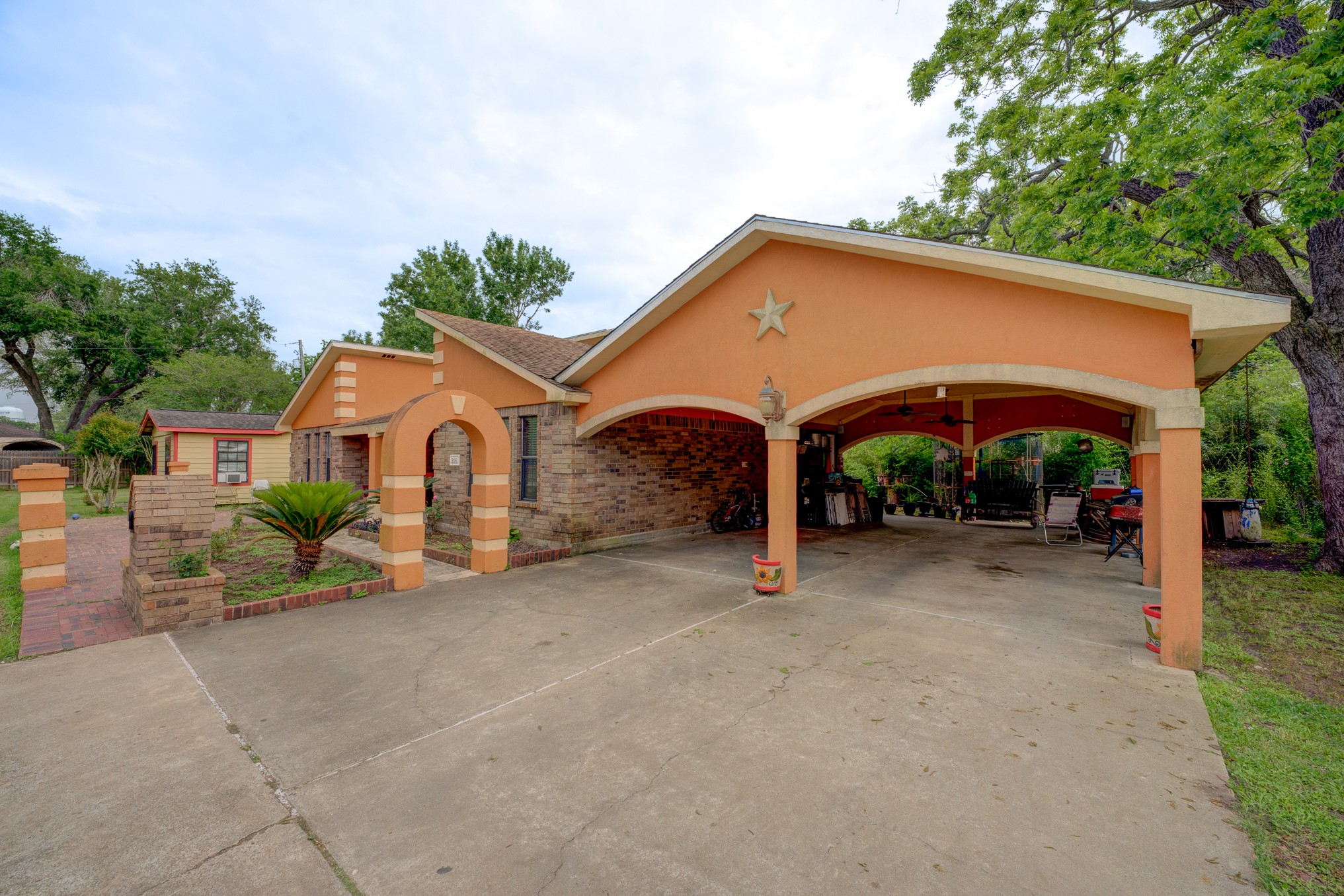 316 Hickman Lane Angleton, TX 77515 - Photo 41 of 48 a view of a house with a yard and large tree