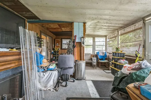 a bathroom with a sink a mirror and a window