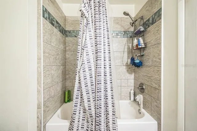 a bathroom with a sink and a window