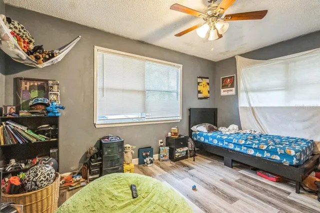 a kitchen with cabinets appliances and a window