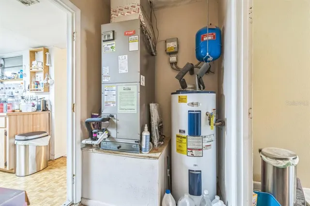 a front view of a house with swimming pool having outdoor seating