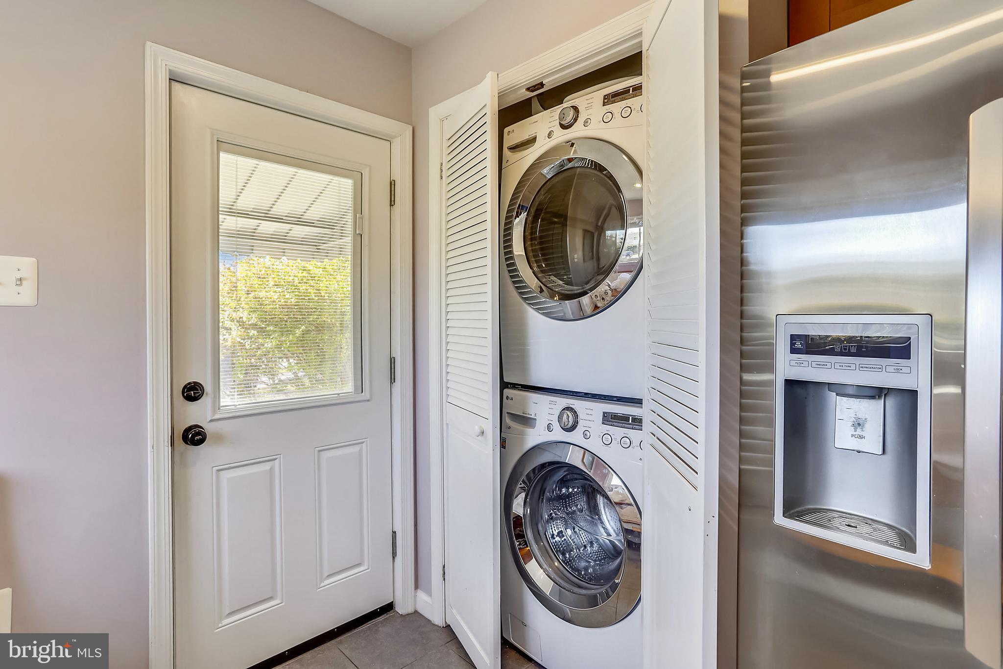11309 College View Drive Silver Spring, MD 20902 - Photo 13 of 34 Full sized front loading washer and dryer