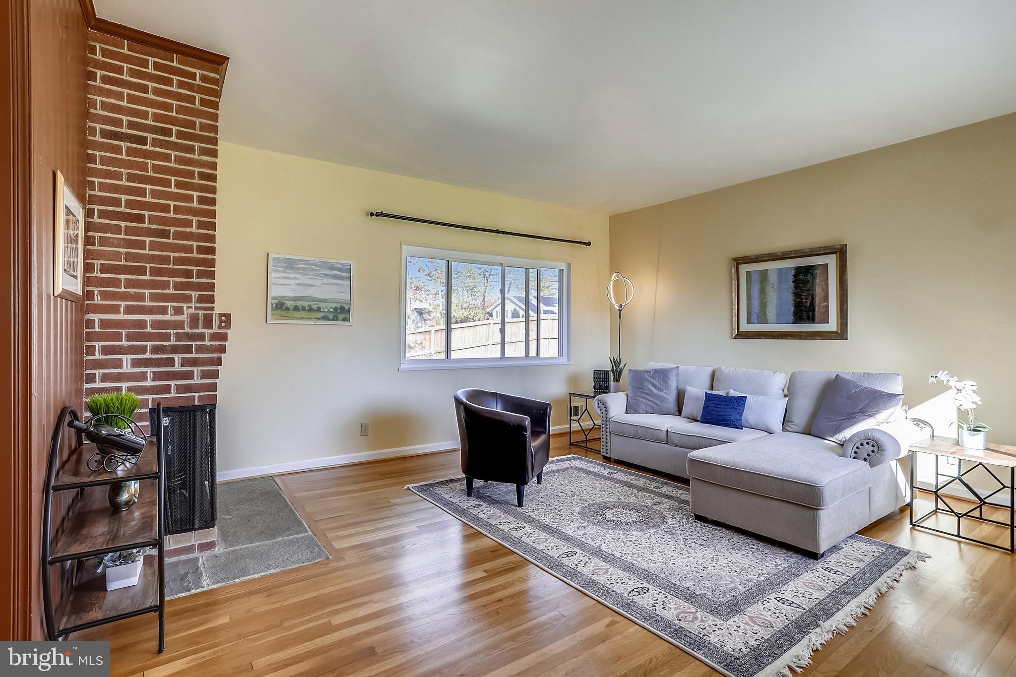 11309 College View Drive Silver Spring, MD 20902 - Photo 20 of 34 Large, light filled living room with WB Fireplace