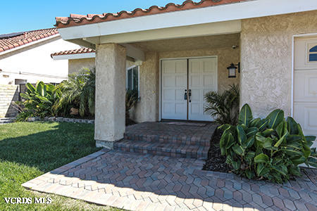 4854 Avedon Road Moorpark, CA 93021 - Photo 3 of 26 a front view of a house with garden