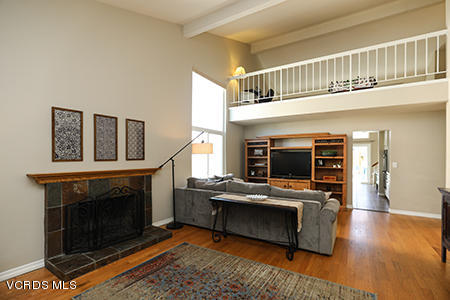 4854 Avedon Road Moorpark, CA 93021 - Photo 8 of 26 a living room with furniture fireplace and wooden floor