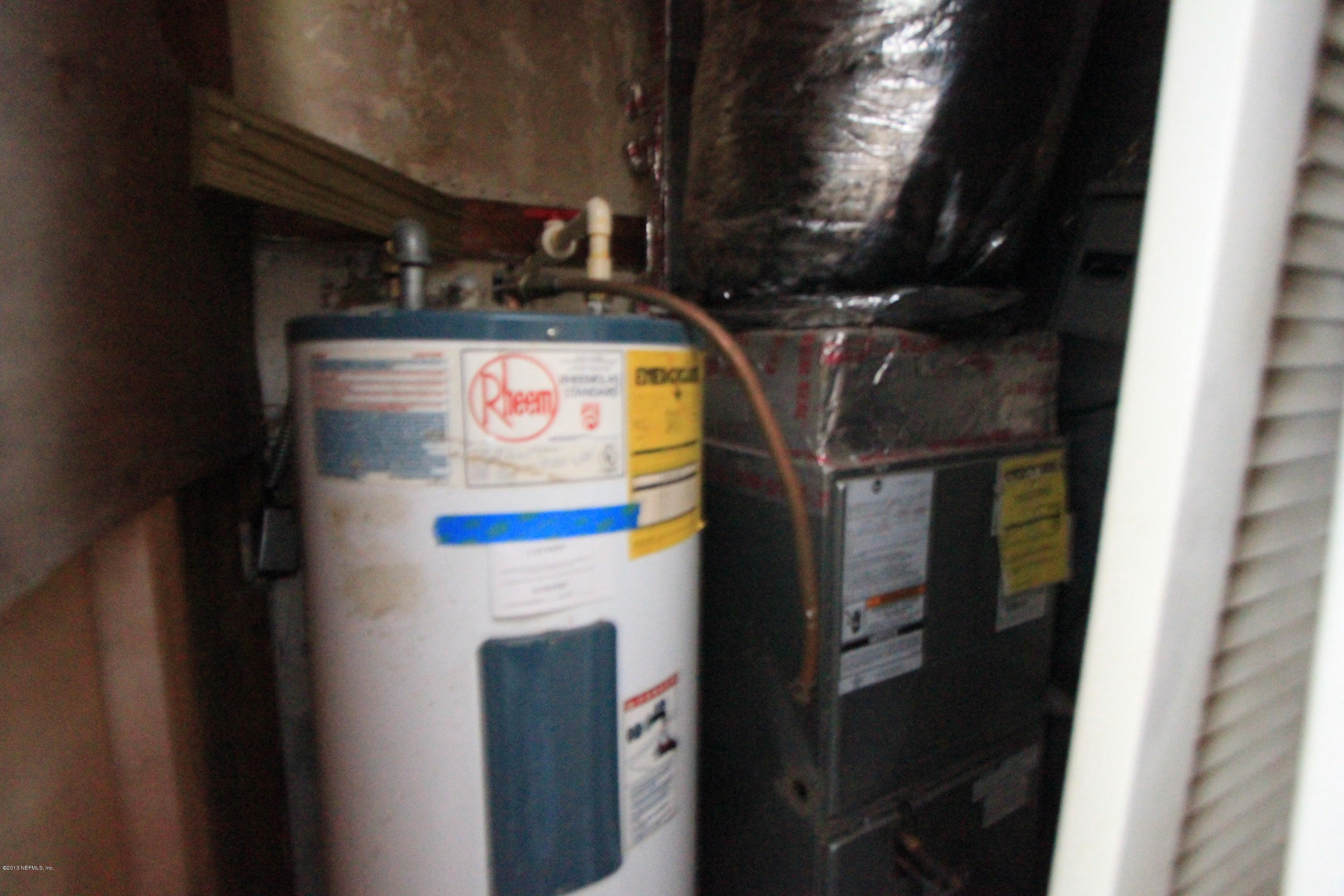 5209 Birkenhead Road Jacksonville, FL 32210 - Photo 14 of 19 a utility room with dryer and washer
