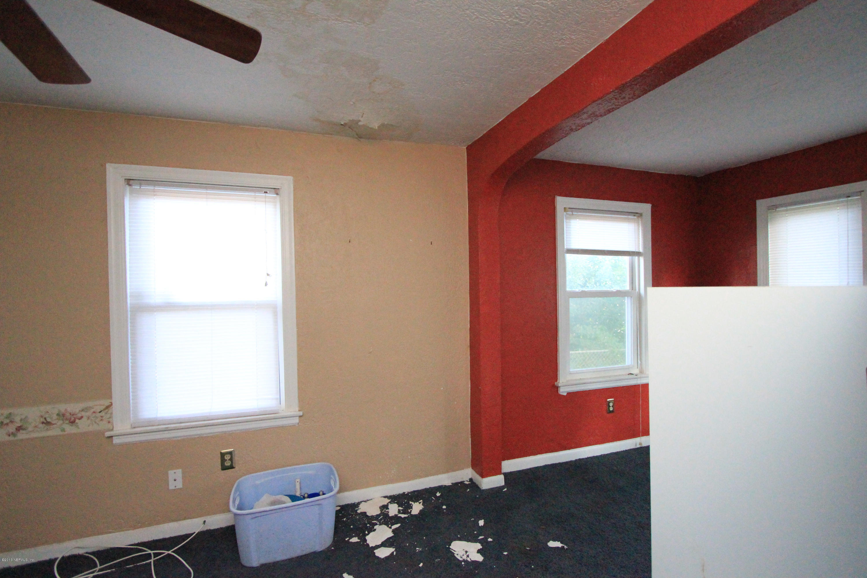 5209 Birkenhead Road Jacksonville, FL 32210 - Photo 7 of 19 a room with furniture and window