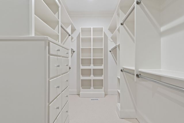 a utility room with cabinets