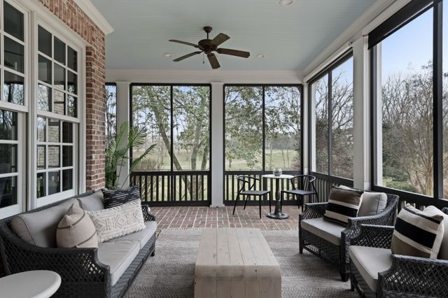 a view of a balcony with wooden floor